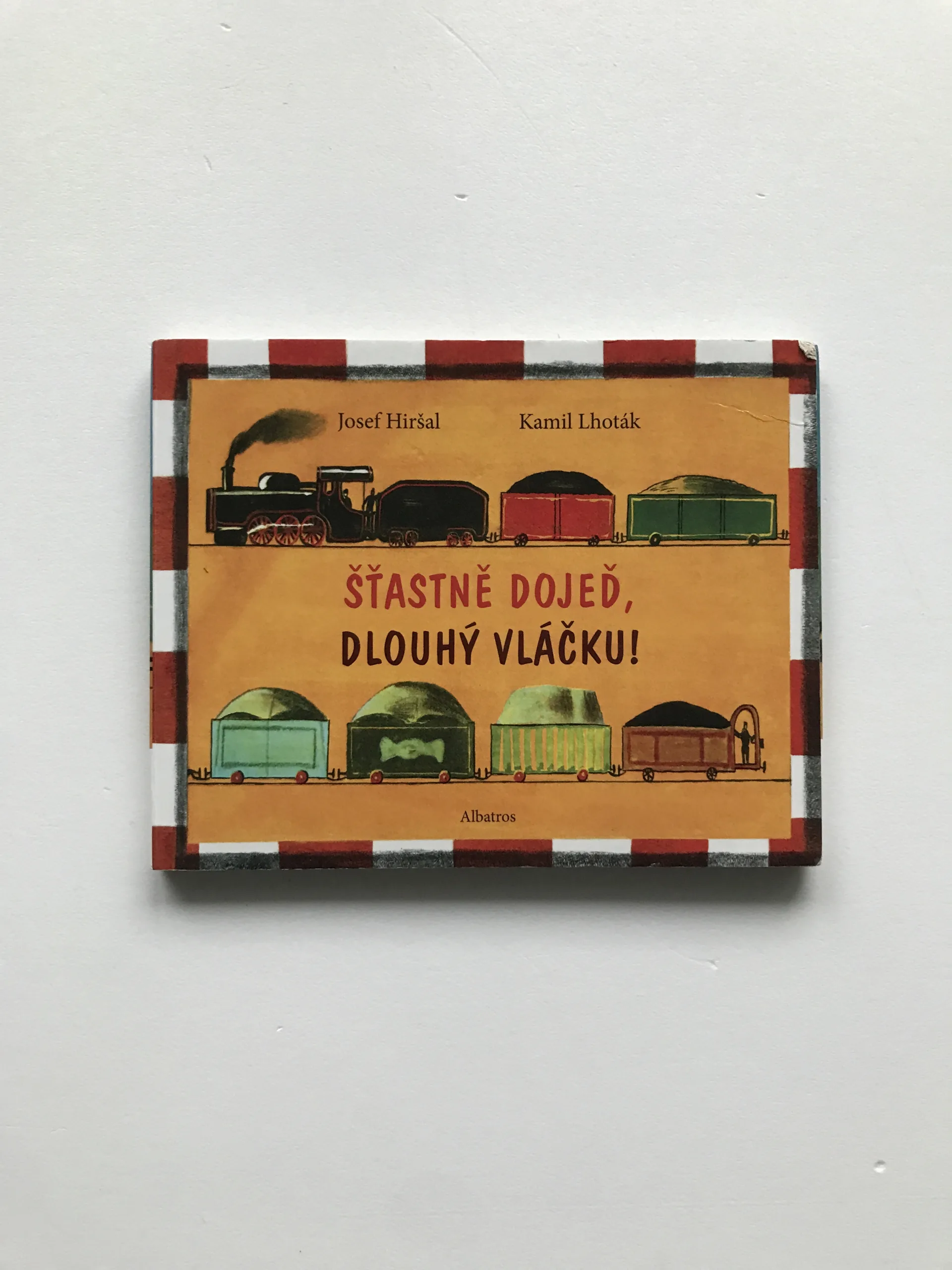 Šťastně dojeď, dlouhý vláčku!, Josef Hiršal, Kamil Lhoták